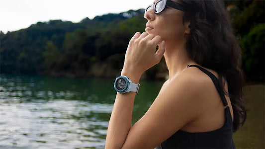 woman wearing garmin descent g1 solar ocean edition watch in water