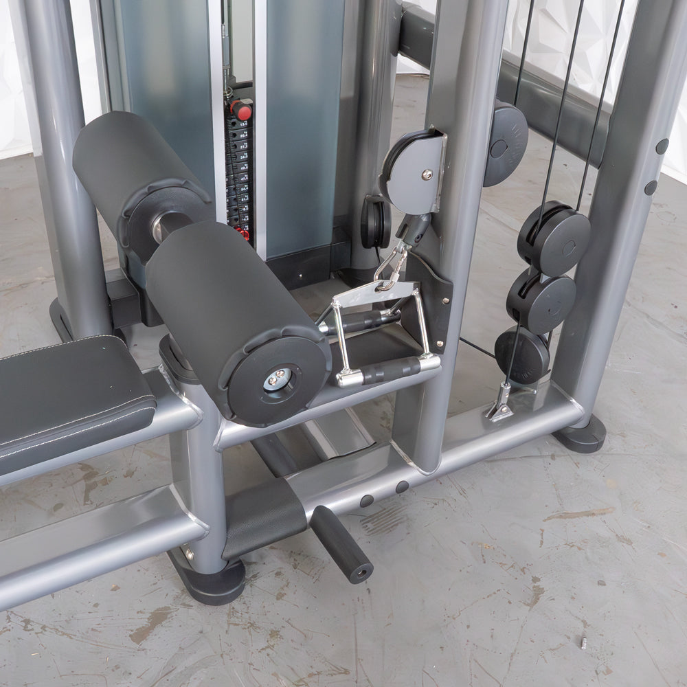Strength training machine featuring padded rollers and adjustable weights for effective workouts.