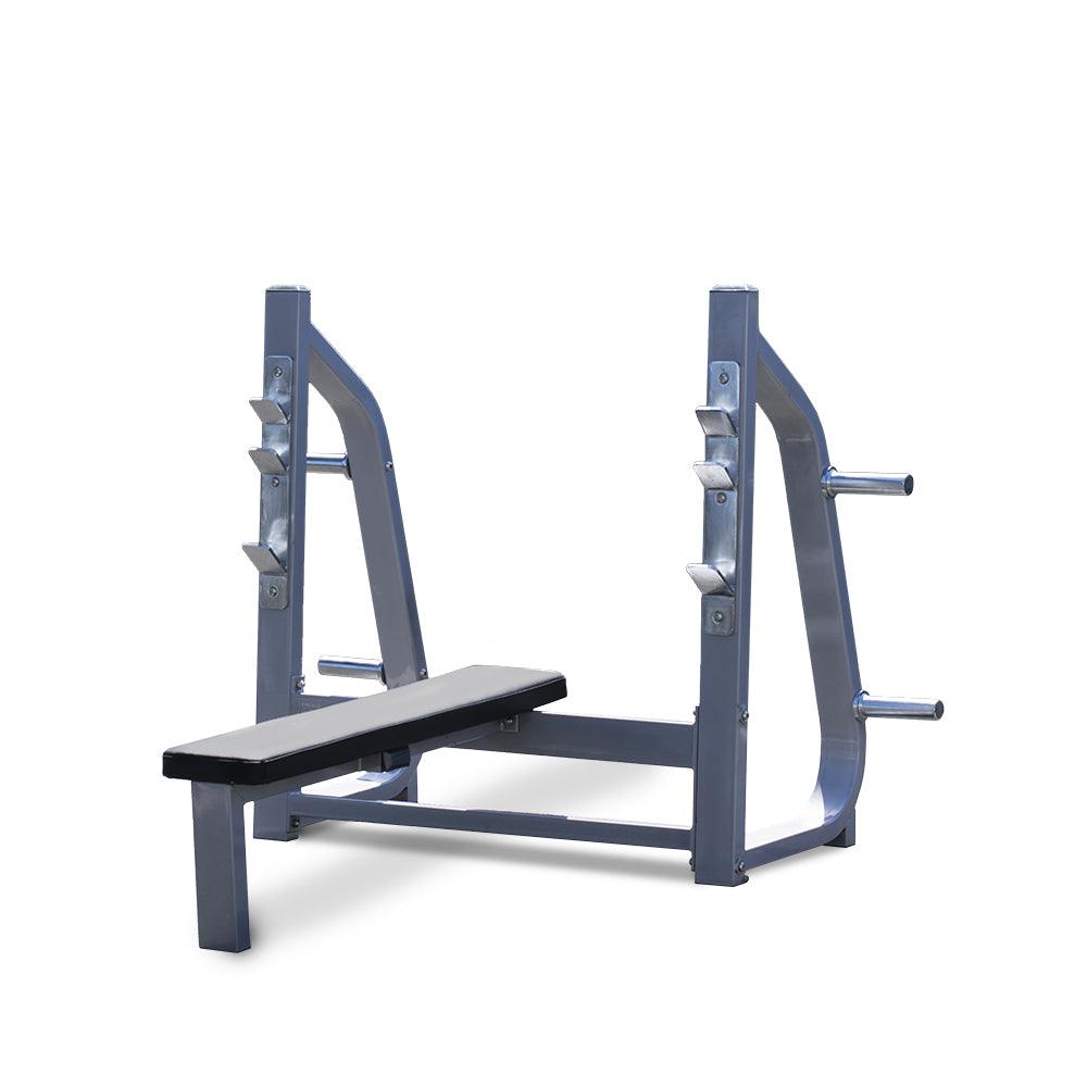 Blue Olympic flat bench with side weight pegs and rack.