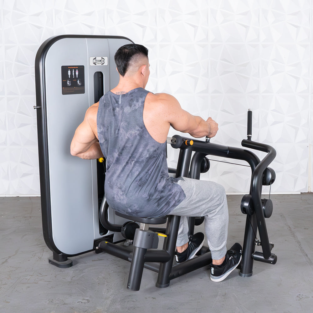 Man using a seated row machine with a black frame for back exercise.