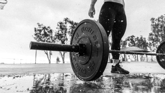 Ez curl bar vs straight bar with barbell on gym floor