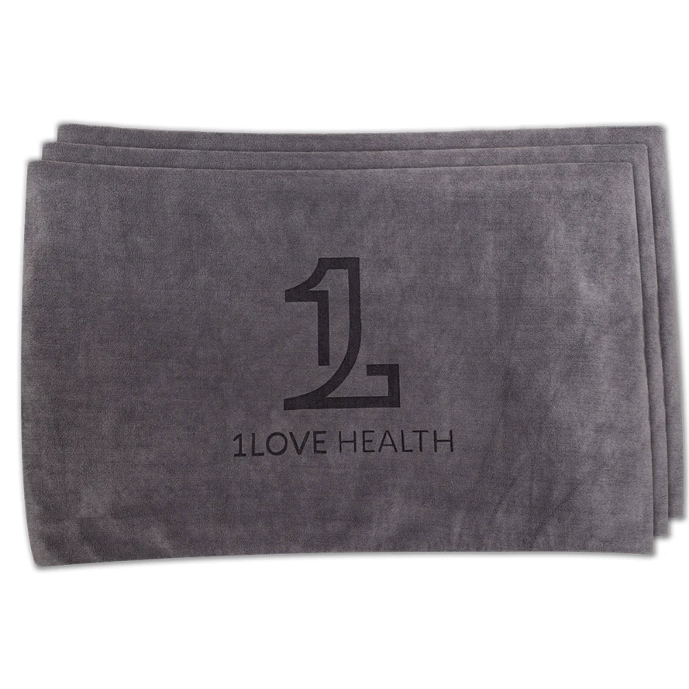 1Love Health Luxury Mat Cover – product hero on bed/mat