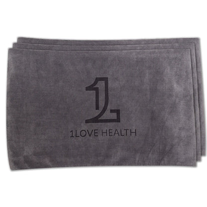 1Love Health Luxury Mat Cover – product hero on bed/mat