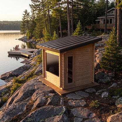 CT Avalon Sauna with black metal roof beside a lake
