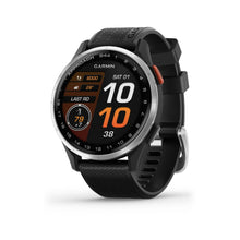 Garmin Approach S44 smartwatch displaying various metrics including time, temperature, and step count.