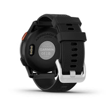 Back view of the Garmin Approach S44 smartwatch, showcasing its black strap and charging contacts.