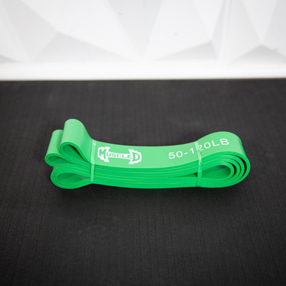 Bright green resistance band with 20 lb marking and MuscleD logo.
