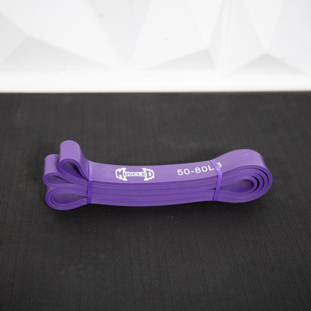 Purple loop resistance band, 50-80 lb, folded and bound.