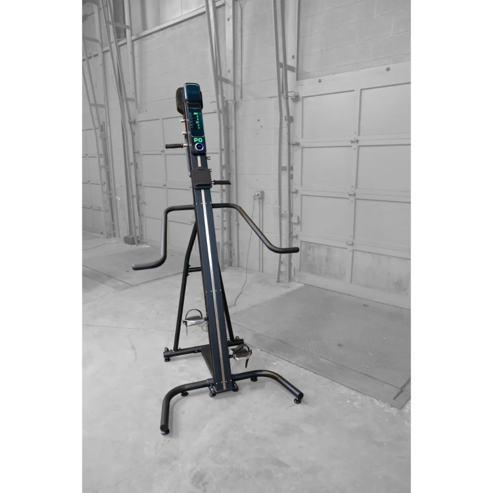 VersaClimber LX mode cardio machine with digital display in a gym setting.