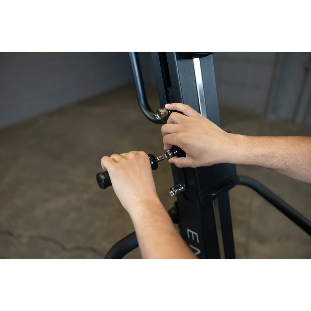 Adjusting handles on black Echelon rowing machine for optimal fitness workout.