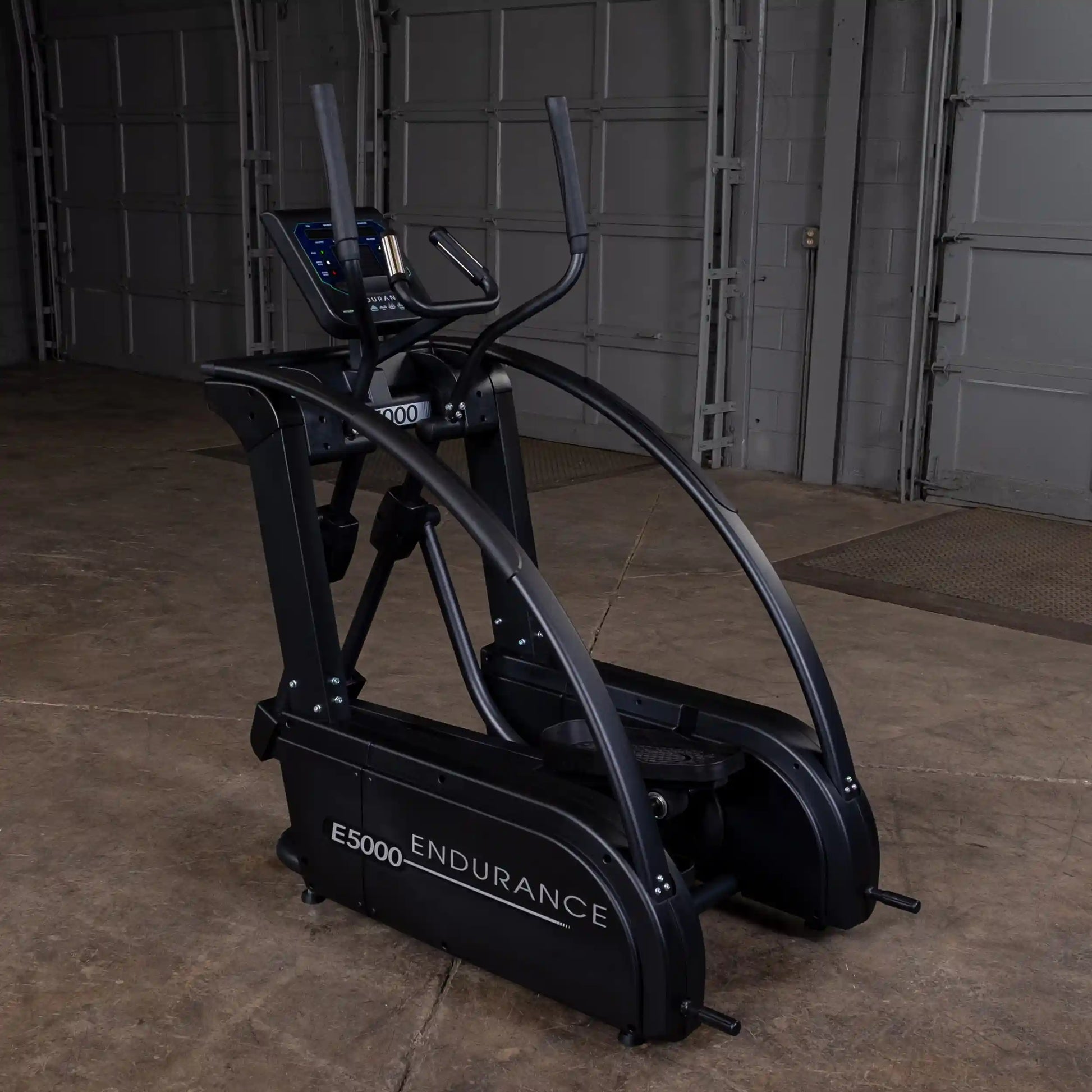 Endurance E5000 elliptical trainer in black with a sleek curved design for advanced cardio workouts.