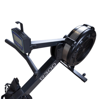 R300 rowing machine with digital monitor and sleek black design.