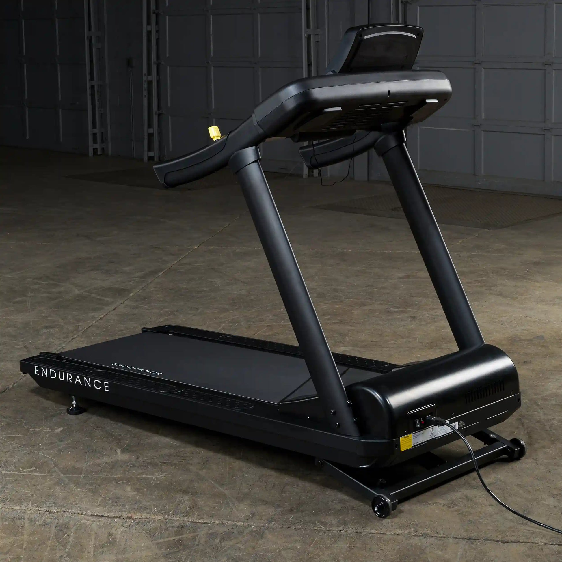 Endurance treadmill in black with sturdy frame, ideal for home workouts.
