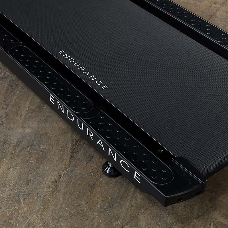 Endurance treadmill with textured black surface, highlighting durability.
