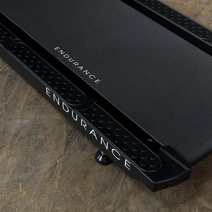 Endurance treadmill with textured black surface, highlighting durability.