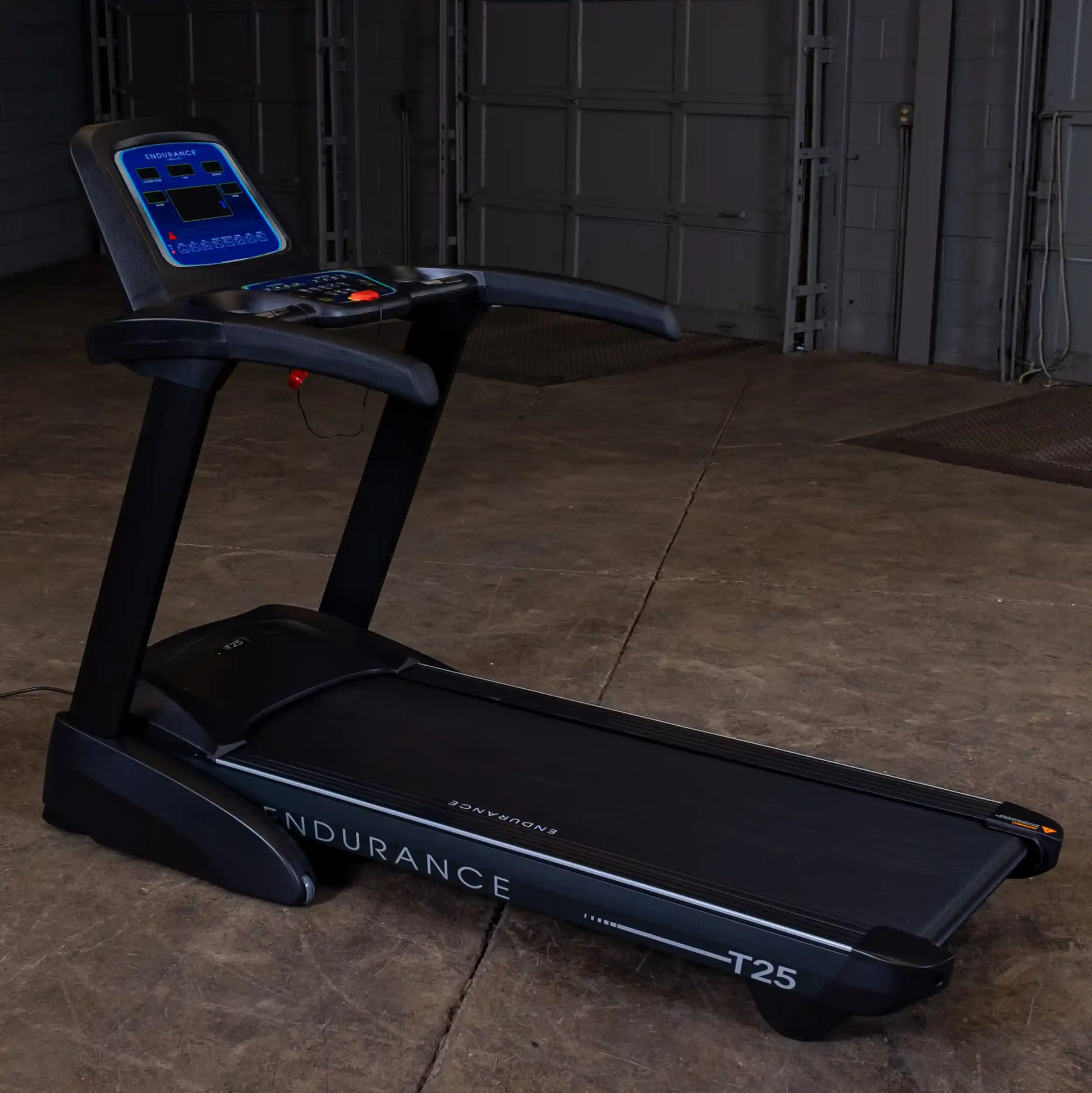 Endurance T25 treadmill with digital display in a gym setting.