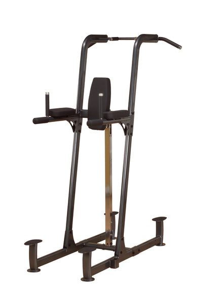 Black power tower with padded armrests for strength training exercises.