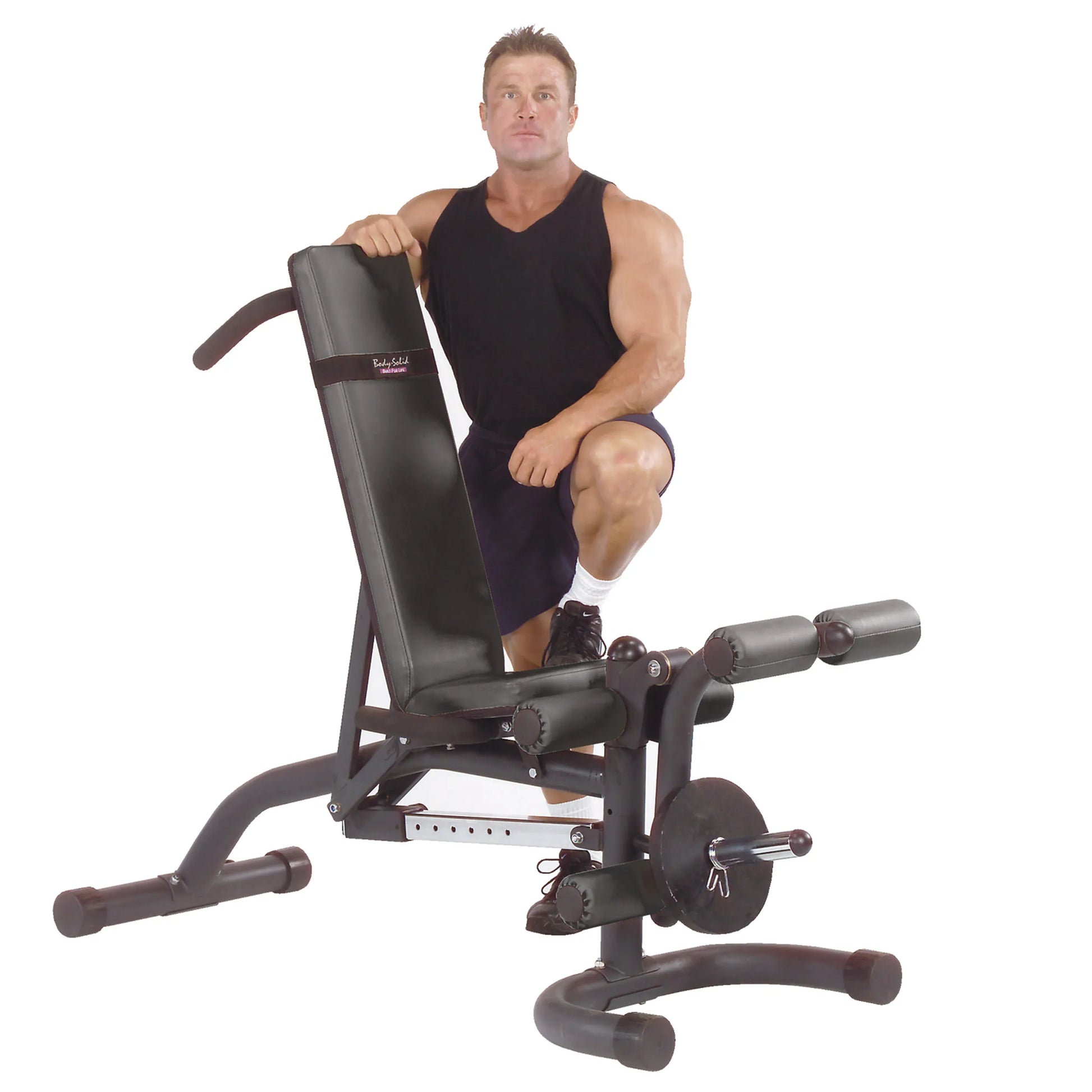 Body-Solid PowerCenter bench with leg developer, featuring black upholstery and sturdy steel frame.