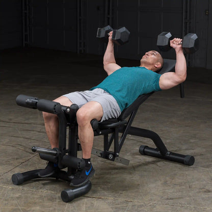Man performing incline dumbbell press on black weight bench.
