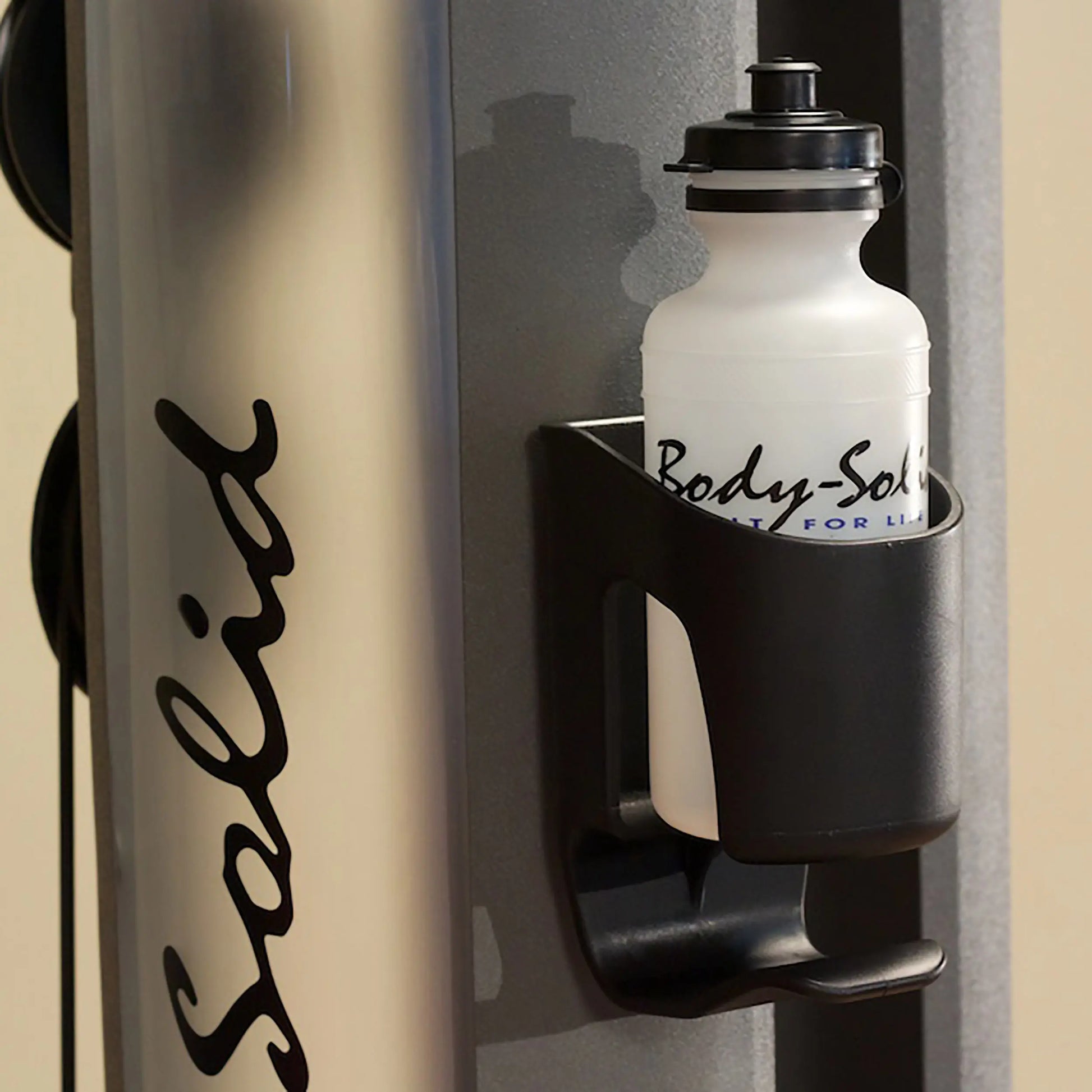 Body-Solid water bottle on gym equipment holder.
