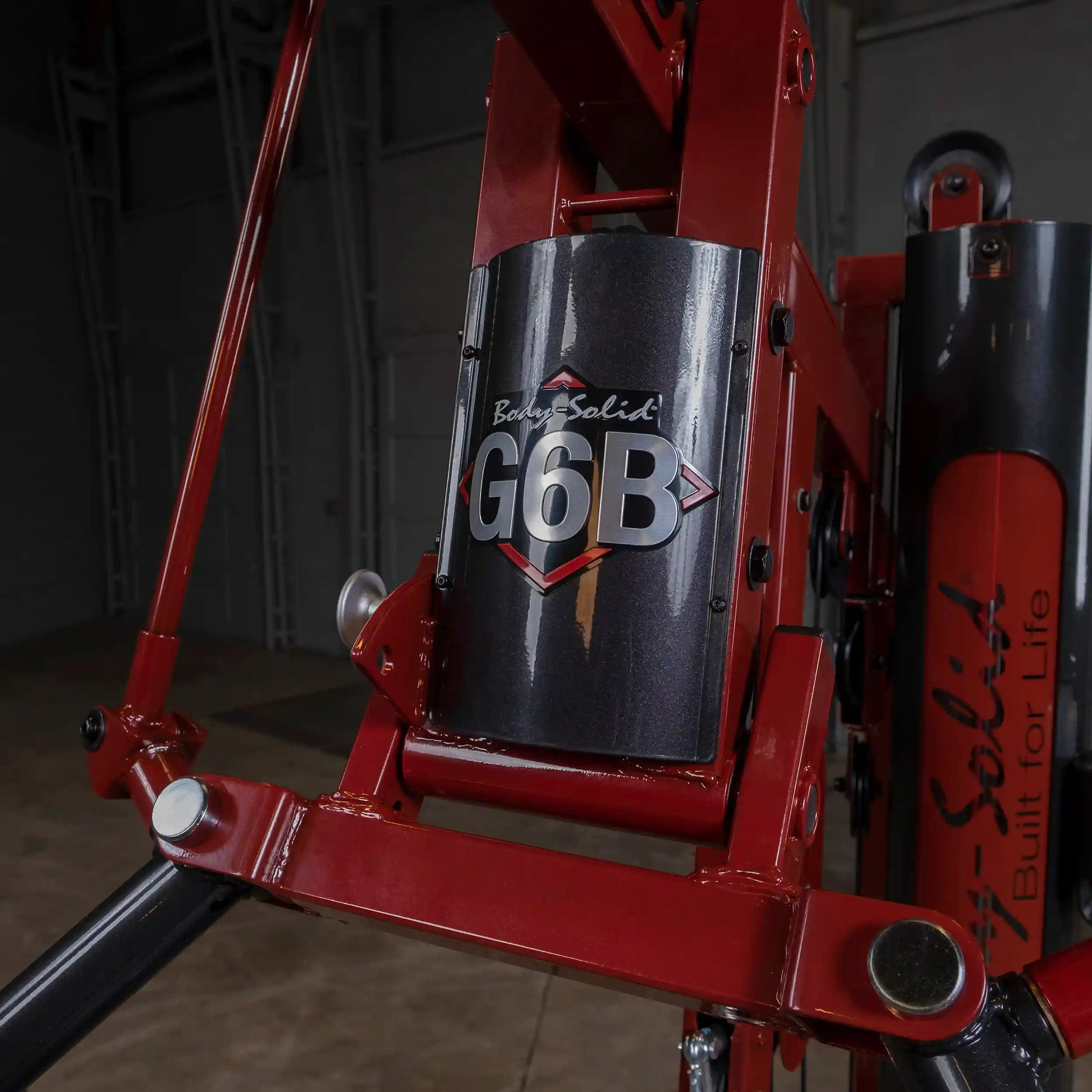 Body-Solid G6B gym equipment in red with sleek black detailing.