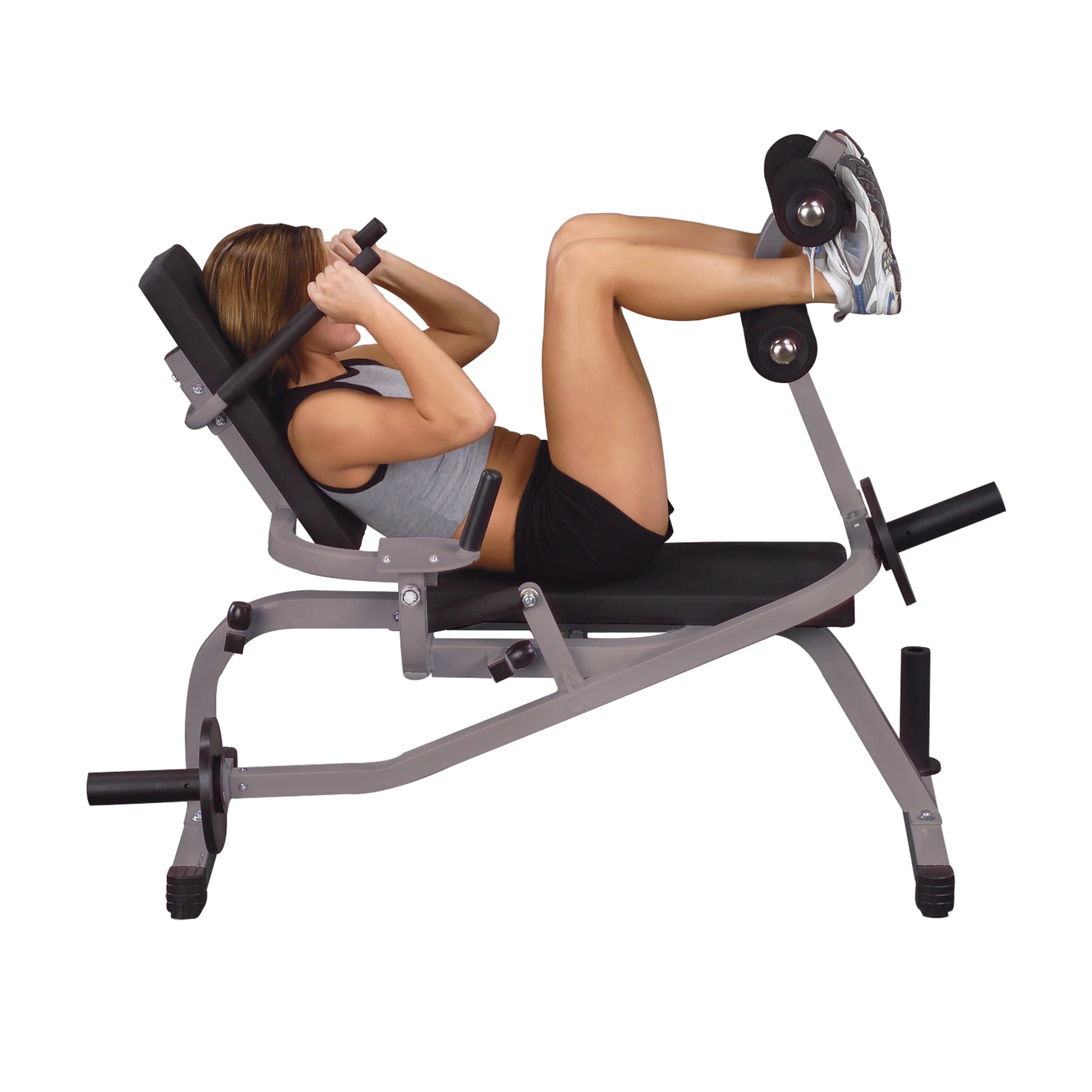 Woman exercising on black Powerline ab bench with silver frame.