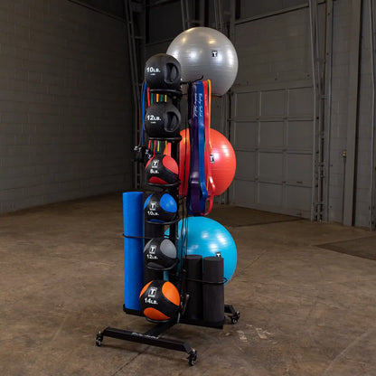 exercise equipment rack with kettlebells, medicine balls, yoga mats, and resistance bands.