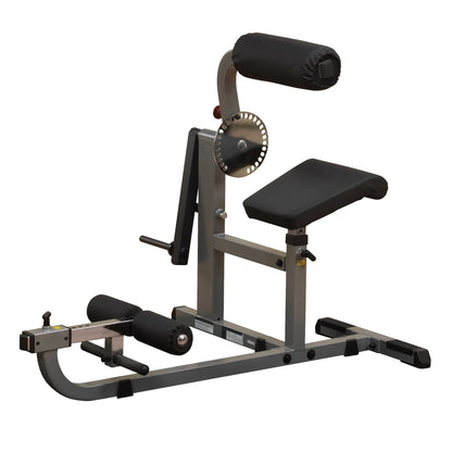 Body-Solid adjustable sissy squat machine with padded supports for leg workouts.
