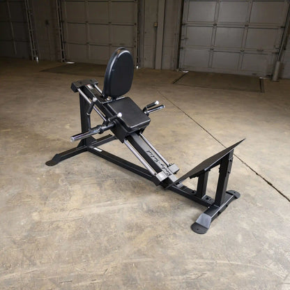Black Rogue Reverse Hyper machine in a garage gym setting.