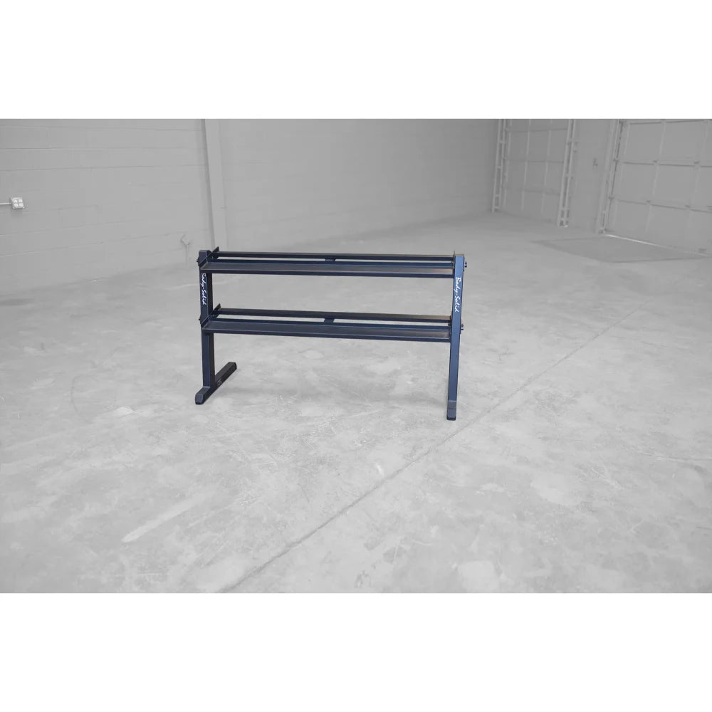 Rogue Metal Squat Rack in blue, set in an empty gym space.