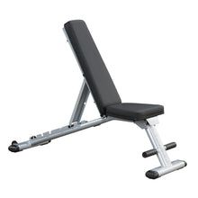Adjustable weight bench with black padding and silver frame for home gym use.