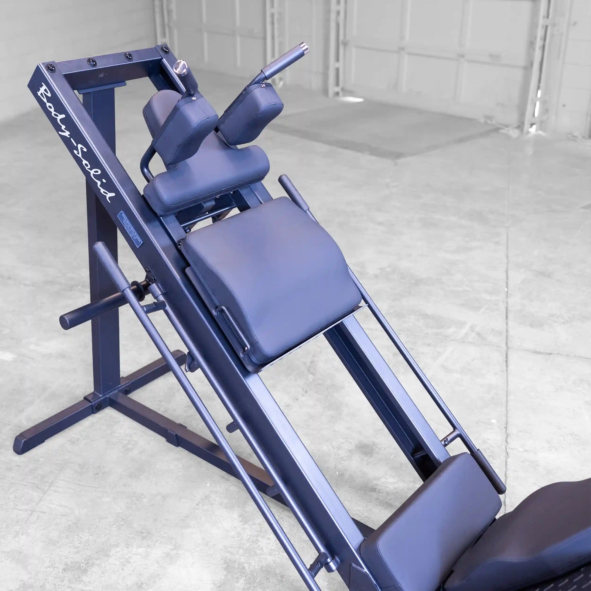 Body-Solid back hyperextension machine in blue for core strengthening.