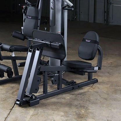 Body-Solid leg press machine in sleek black finish, ideal for home gym workouts.
