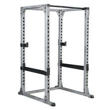 Steel power rack with adjustable safety bars for home gym workouts.