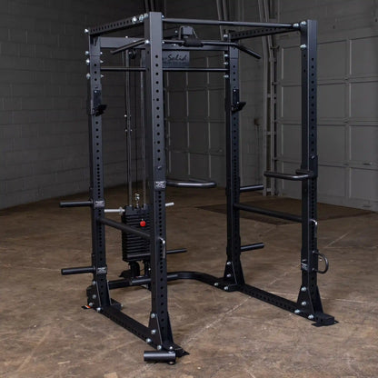 Body-Solid power rack with weight stack in black for home gym strength training.