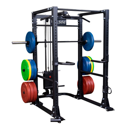 Body-Solid power rack with colorful weight plates, ideal for home gym strength training.