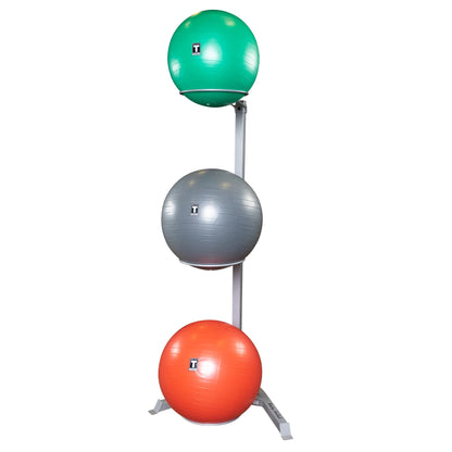 Stacked exercise balls on a metal rack, featuring green, gray, and orange colors, ideal for gym storage.