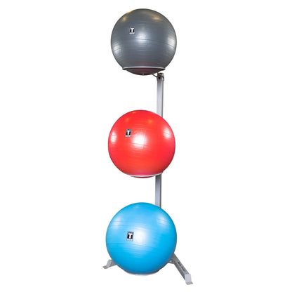 Three TKO stability balls in gray, red, and blue on a vertical stand.