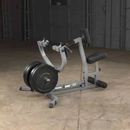 Body-Solid seated row machine with weight plates, gray color, ideal for strength training in home gyms.
