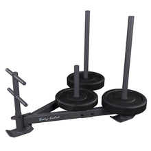 Body-Solid weight sled with black plates, ideal for strength training.