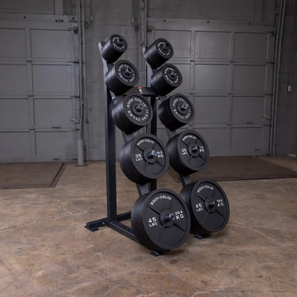 Body-Solid black weight plate rack with multiple plates in a gym setting.