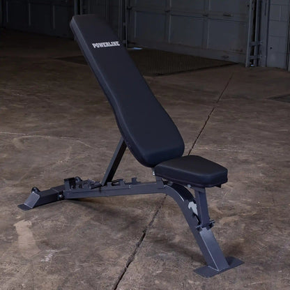 Adjustable weight bench by Powerline, featuring a sturdy metal frame and padded seating, positioned on a concrete floor in a gym environment.