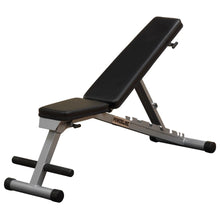 Adjustable weight bench with a black padded surface and silver metal frame, designed for strength training exercises.