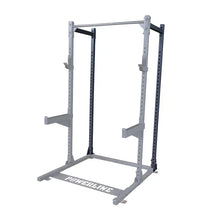 A Powerline squat rack with adjustable safety bars and a sturdy frame, designed for strength training and weightlifting exercises.