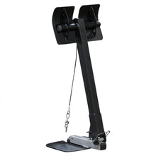 A black fitness equipment piece designed for resistance training, featuring two adjustable pulleys at the top, a sturdy vertical post, and a footplate at the base for stability.