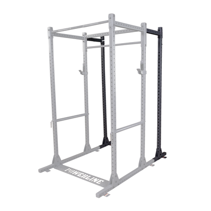 A sturdy black power rack designed for strength training, featuring multiple adjustable pull-up bars and safety hooks.