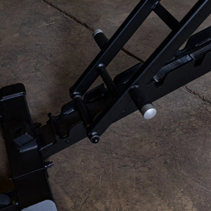 Close-up view of the adjustment mechanism of the Body-Solid Pro ClubLine Adjustable Bench SFID325, showcasing its sturdy construction and design.