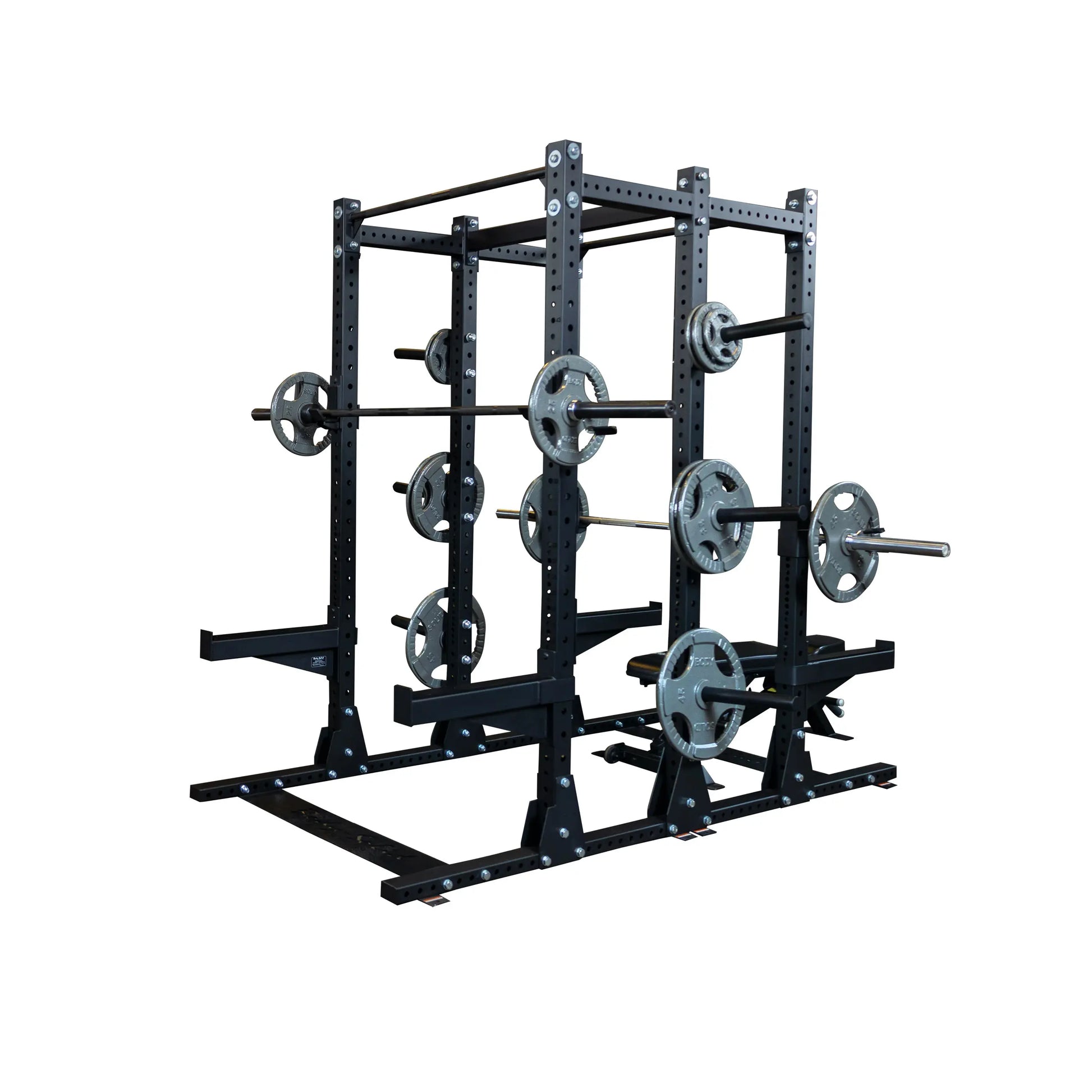 Body-Solid Pro ClubLine Commercial Double Half Rack Kit SPRDBLKIT with multiple weight plates and barbells, featuring a sturdy black metal frame.