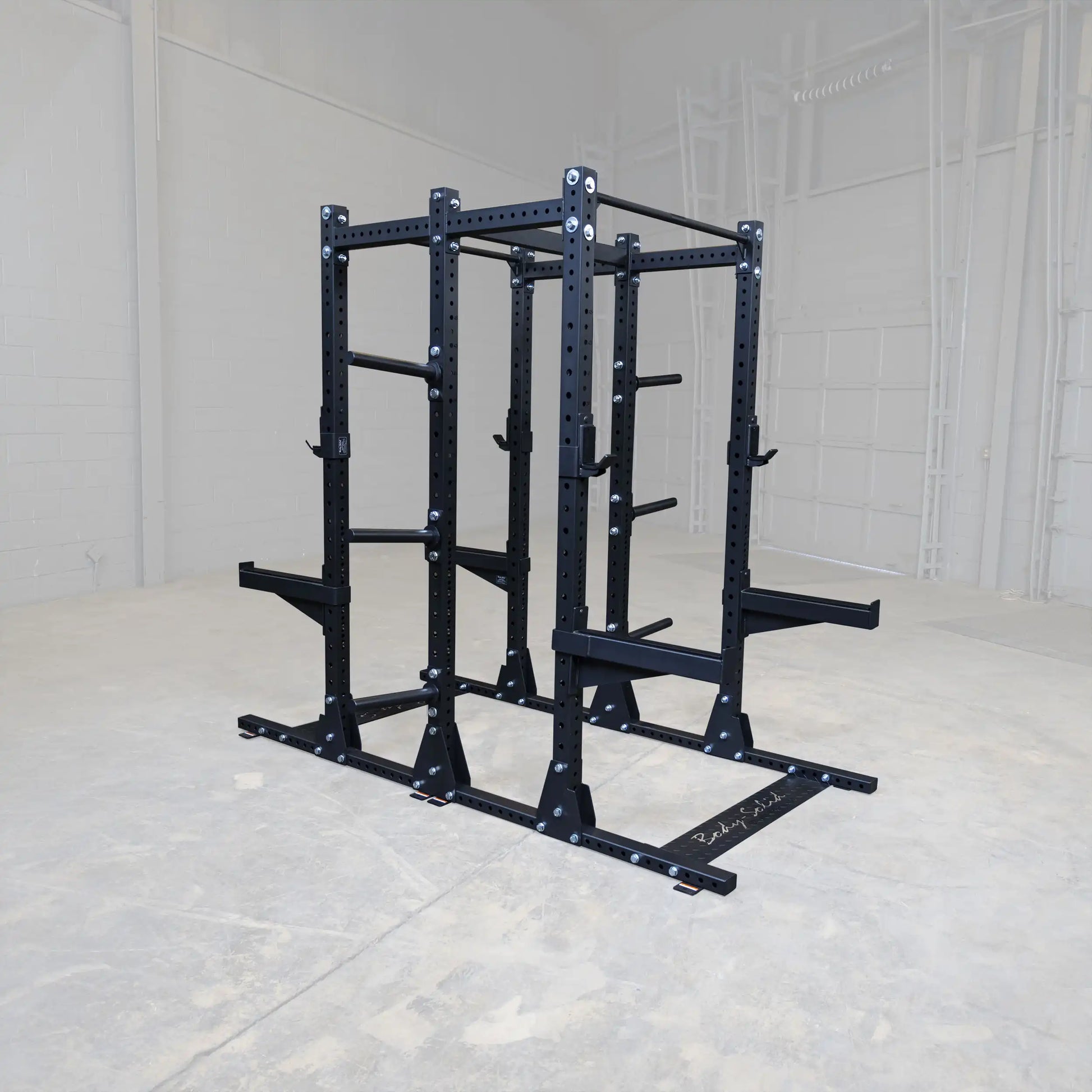 Body-Solid Pro ClubLine Double Commercial Half Rack SPR500DBL in an empty gym space.