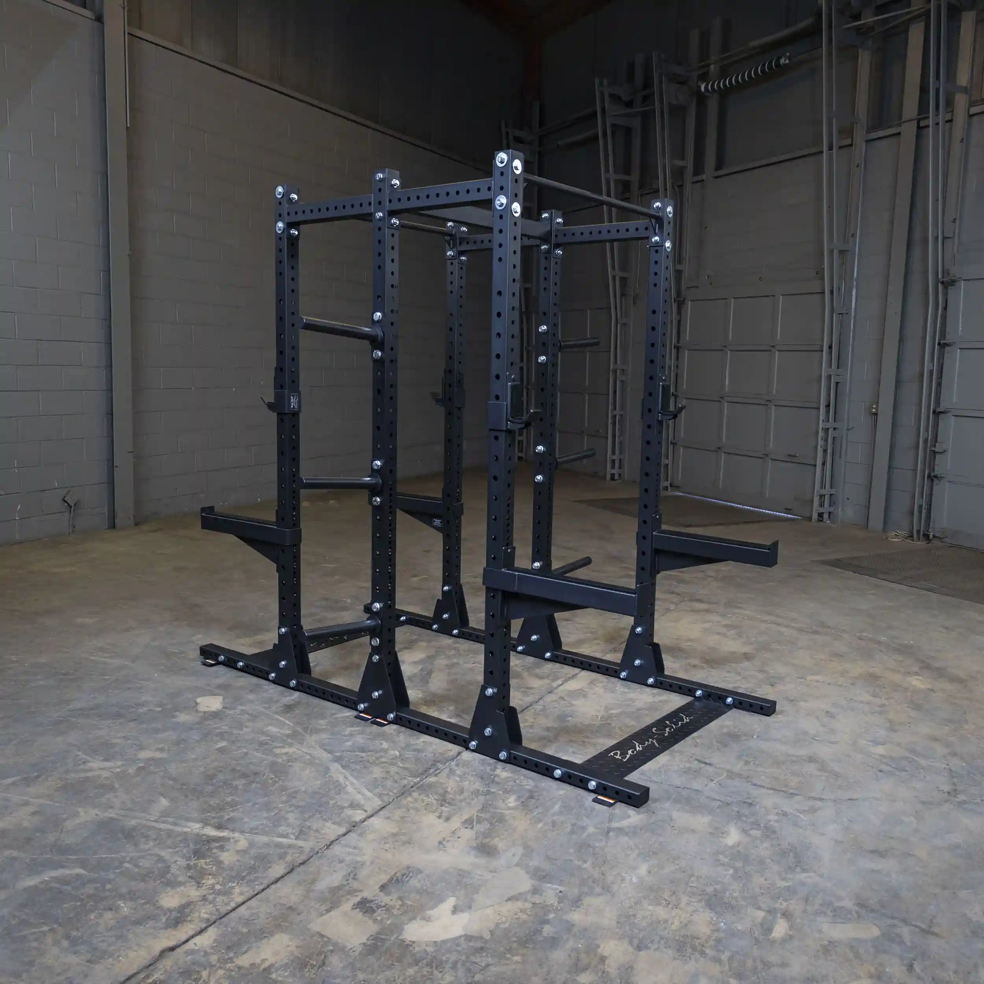 Body-Solid Pro ClubLine Double Commercial Half Rack SPR500DBL in an industrial gym setting.